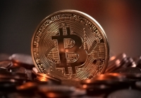 Биткоин подорожал до 100 тыс. долларов впервые с февраля 2025 года - Фото