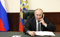 Путин и Макрон провели первый телефонный разговор за три года - Фото