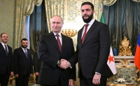 Путин провел первую встречу с временным президентом Сирии аш-Шараа - Фото