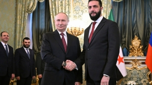 Путин провел первую встречу с временным президентом Сирии аш-Шараа - Фото